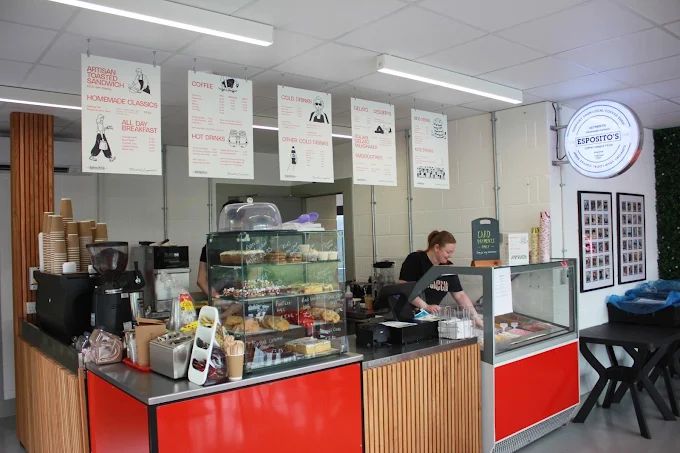 Esposito's Pickering's Pasture counter serving coffee, cakes and food