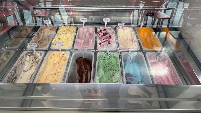 Selection of colourful gelato ice cream flavours in the Esposito's display counter